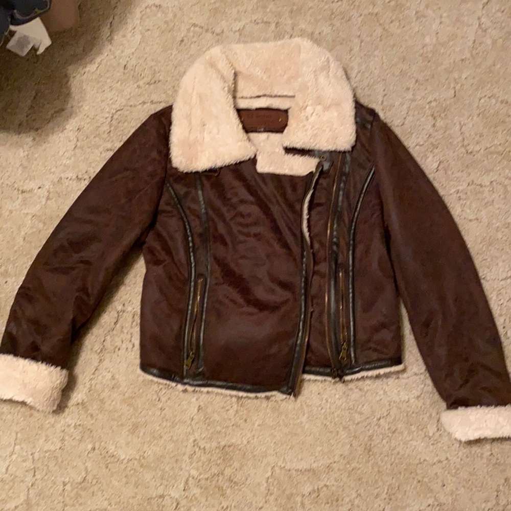 Earthy cross zipper jacket with brown leather re-outside and warm inside